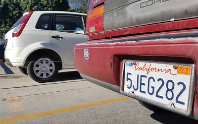 Long lines to register ‘chocolate cars’ in Tijuana